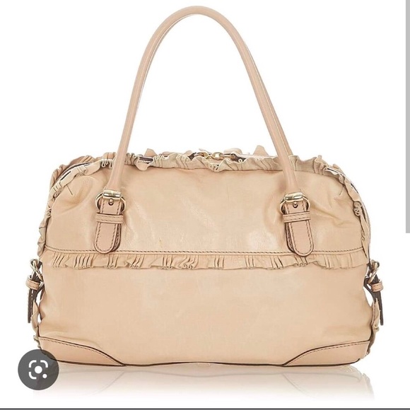 Gucci Handbags - Authentic Gucci Sabrina small handbag gold
